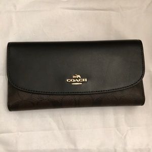 Brown and Black Coach Wallet